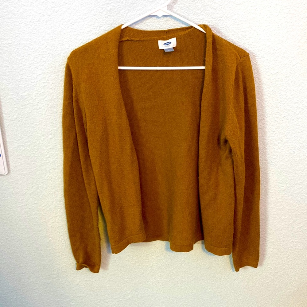 A medium old navy orangeish cardigan.